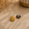 Broches / Boucles d'oreilles noir & or